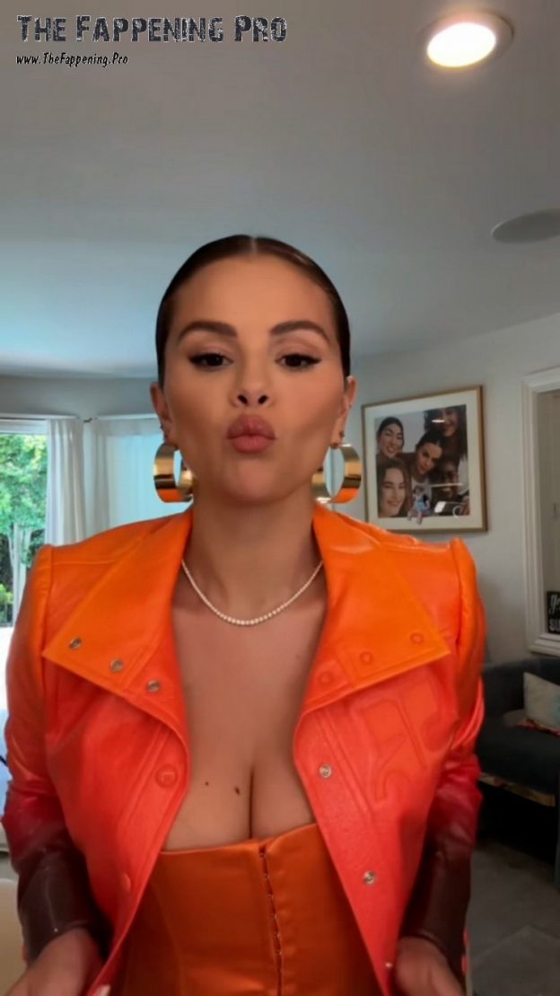 Selena Gomez Big Tits In Orange Dress (9 Photos And GIF) 10 Selena Gomez Tits TheFappening.Pro 2 624x1109 1