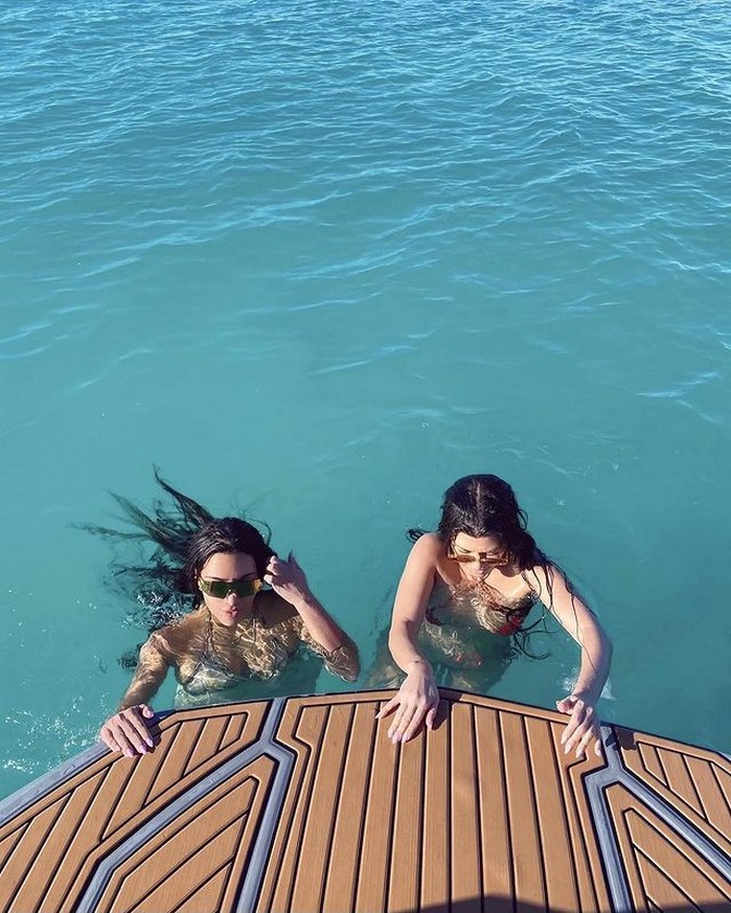 kim-kardashian-tries-on-a-new-swimwear-trend-thefappening-cfd-5 kim kardashian tries on a new swimwear trend thefappening cfd 5
